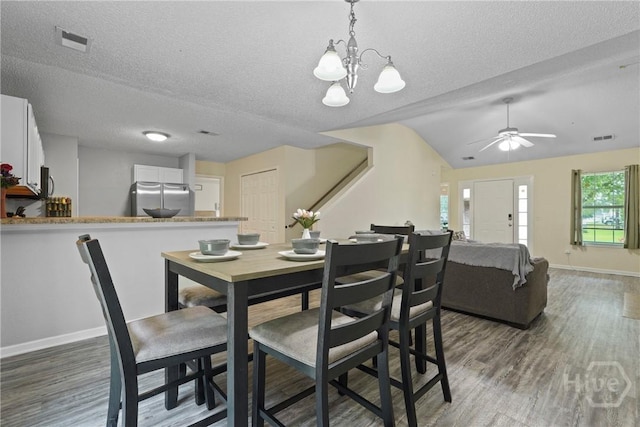 21 Hawser Way, Port Wentworth, GA 31407 - dining area with dark wood finished floors, baseboards, a textured ceiling, ceiling fan, and vaulted ceiling