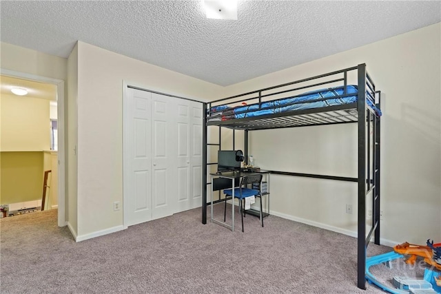 21 Hawser Way, Port Wentworth, GA 31407 - bedroom featuring carpet floors, an office area, a textured ceiling, baseboards, and a closet