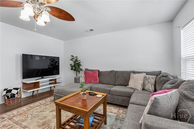 231 Tigers Paw Dr, Pooler, GA 31322 - living area with ceiling fan, wood finished floors, and a textured ceiling