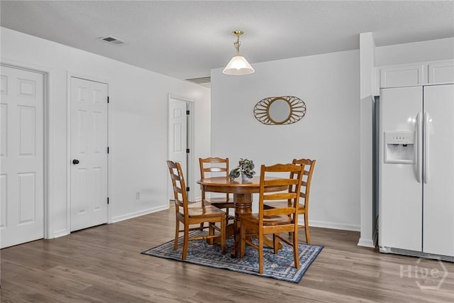 231 Tigers Paw Dr, Pooler, GA 31322 - dining space with wood finished floors and baseboards