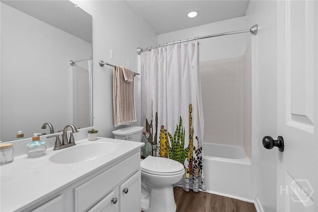 231 Tigers Paw Dr, Pooler, GA 31322 - full bathroom with vanity, toilet, wood finished floors, and shower / bath combo with shower curtain