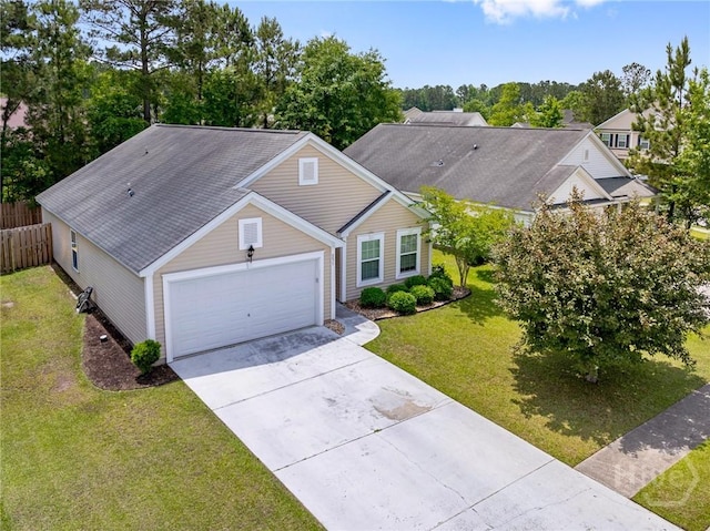 231 Tigers Paw Dr, Pooler, GA 31322 - ranch-style house featuring a garage, concrete driveway, and a shingled roof