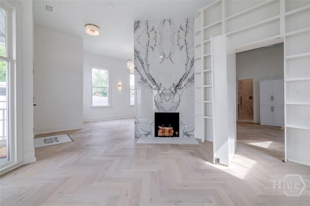 316 W 38th St, Savannah, GA 31401 - unfurnished living room with a fireplace and baseboards