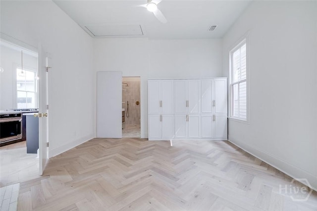 316 W 38th St, Savannah, GA 31401 - unfurnished bedroom with baseboards, a ceiling fan, and connected bathroom