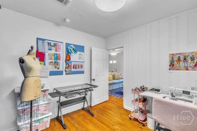 2117 E 42nd St, Savannah, GA 31404 - home office with light wood-style flooring and ornamental molding