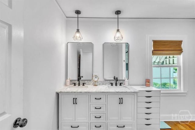 2117 E 42nd St, Savannah, GA 31404 - bathroom with double vanity and baseboards