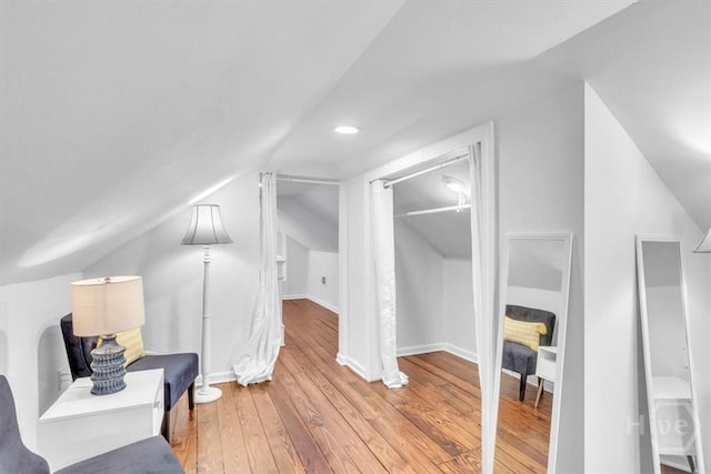 2117 E 42nd St, Savannah, GA 31404 - additional living space with vaulted ceiling, wood-type flooring, and baseboards