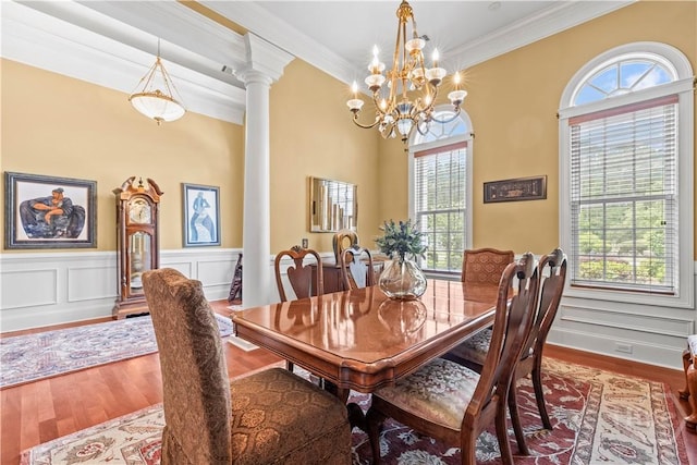 312 Spanton, Pooler, GA 31322 - dining space featuring ornate columns, wood finished floors, a chandelier, a wainscoted wall, and crown molding