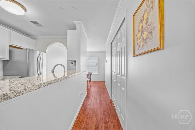1 Westbourne Way, Savannah, GA 31407 - hallway with dark wood-style flooring, ornamental molding, baseboards, and a sink