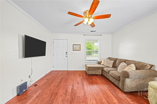 1 Westbourne Way, Savannah, GA 31407 - living room with wood finished floors, crown molding, ceiling fan, and baseboards