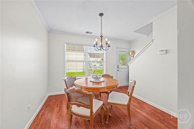 1 Westbourne Way, Savannah, GA 31407 - dining room featuring baseboards, a chandelier, crown molding, and wood finished floors