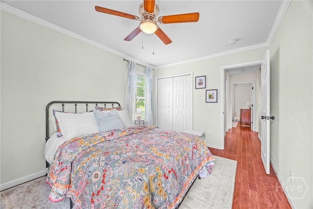 1 Westbourne Way, Savannah, GA 31407 - bedroom featuring ornamental molding, wood finished floors, a closet, baseboards, and ceiling fan