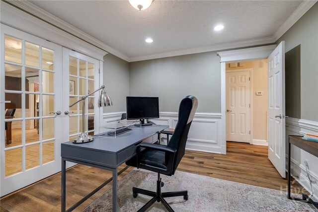103 W Gazebo Ln, Savannah, GA 31410 - office space featuring french doors, wood finished floors, crown molding, a wainscoted wall, and recessed lighting