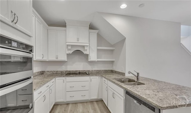 20 Lower Creek Dr, Richmond Hill, GA 31324 - kitchen featuring open shelves, stainless steel appliances, a sink, a peninsula, and white cabinetry