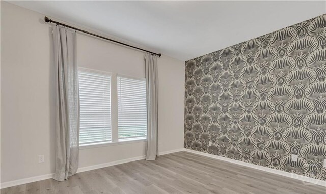 20 Lower Creek Dr, Richmond Hill, GA 31324 - empty room with wood finished floors and baseboards