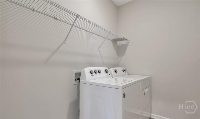 20 Lower Creek Dr, Richmond Hill, GA 31324 - washroom with washing machine and dryer and baseboards