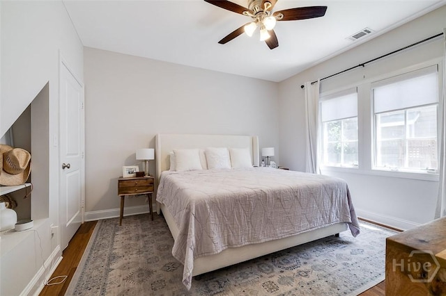 115 Daisy Ct, Savannah, GA 31404 - bedroom with wood finished floors, baseboards, and a ceiling fan