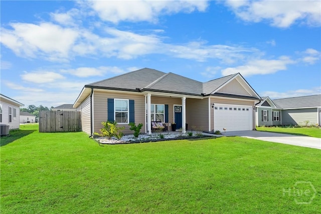 402 Abode Ave, Hinesville, GA 31313 - view of front facade featuring concrete driveway, a porch, an attached garage, and central AC