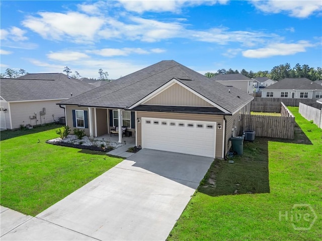 402 Abode Ave, Hinesville, GA 31313 - ranch-style home featuring a garage, driveway, a shingled roof, and central air condition unit