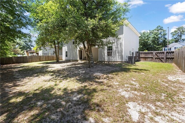 303 Aspen, Rincon, GA 31326 - back of house featuring central air condition unit