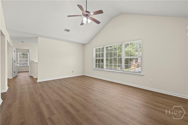 303 Aspen, Rincon, GA 31326 - unfurnished living room with ceiling fan, wood finished floors, baseboards, and high vaulted ceiling