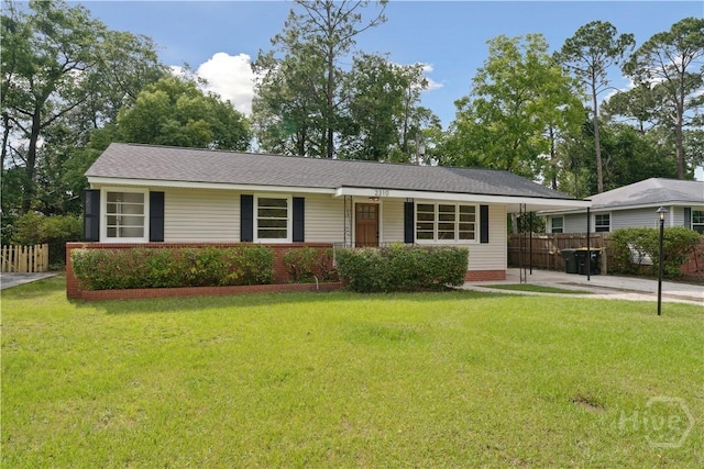 2310 Toussaint Ave, Savannah, GA 31404 - ranch-style house featuring concrete driveway and an attached carport