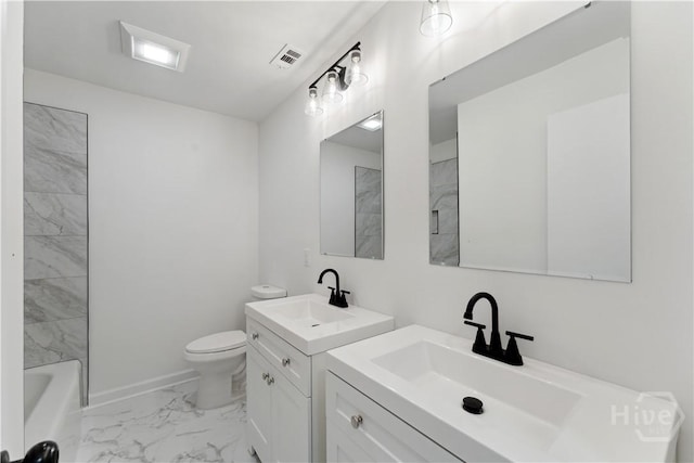 2310 Toussaint Ave, Savannah, GA 31404 - full bathroom with marble finish flooring, toilet, two vanities, and baseboards