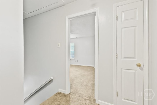 17 Walthour Cv, Savannah, GA 31410 - hallway with light colored carpet, an upstairs landing, attic access, and baseboards