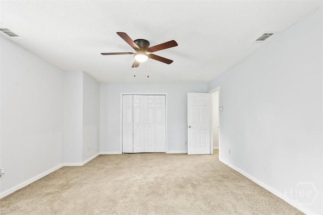 17 Walthour Cv, Savannah, GA 31410 - unfurnished bedroom with light carpet, baseboards, a closet, and a ceiling fan