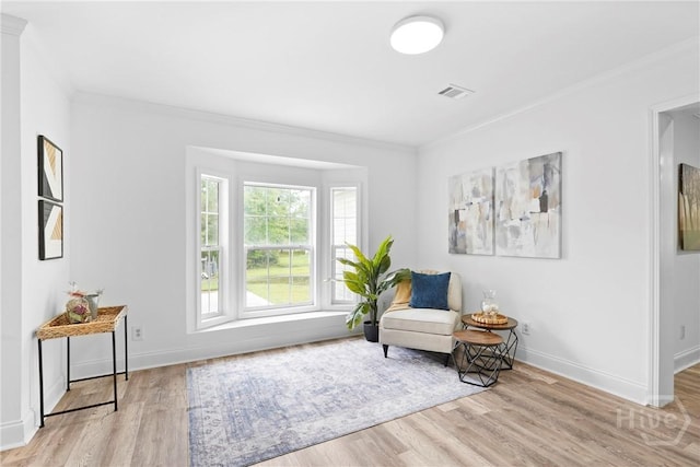 550 Brogdon Rd, Guyton, GA 31312 - living area with wood finished floors, ornamental molding, and baseboards