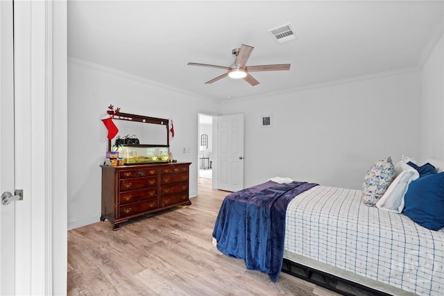 550 Brogdon Rd, Guyton, GA 31312 - bedroom featuring wood finished floors, ornamental molding, baseboards, and ceiling fan