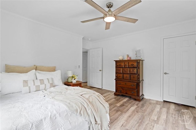 550 Brogdon Rd, Guyton, GA 31312 - bedroom with wood finished floors, ornamental molding, ceiling fan, and baseboards