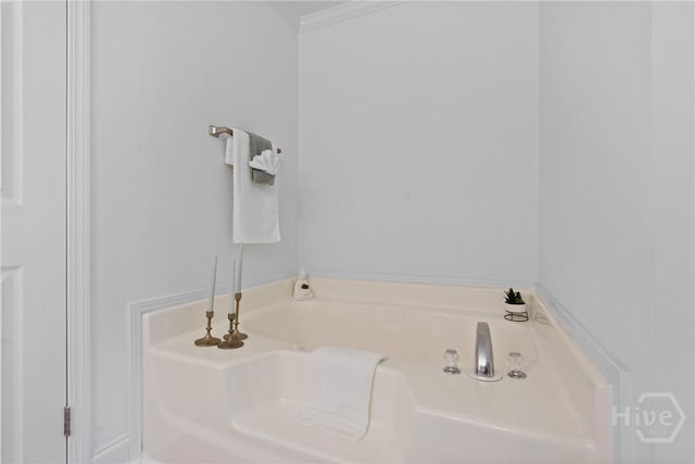 550 Brogdon Rd, Guyton, GA 31312 - bathroom with a garden tub and crown molding
