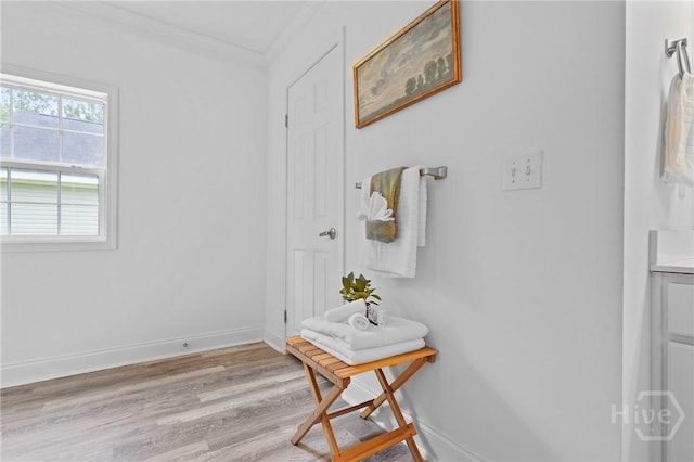 550 Brogdon Rd, Guyton, GA 31312 - hallway featuring light wood-type flooring, ornamental molding, and baseboards