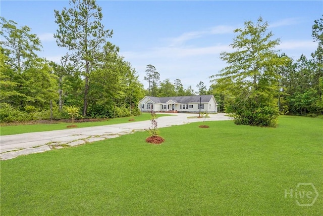 550 Brogdon Rd, Guyton, GA 31312 - single story home featuring concrete driveway and a front lawn