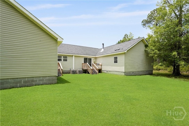550 Brogdon Rd, Guyton, GA 31312 - rear view of property with crawl space, a yard, central AC, and roof with shingles
