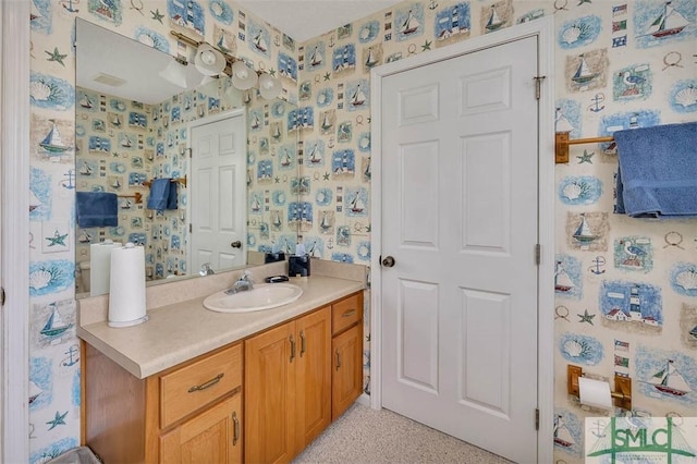 1056 Fiddler Trce, Townsend, GA 31331 - bathroom with wallpapered walls and vanity