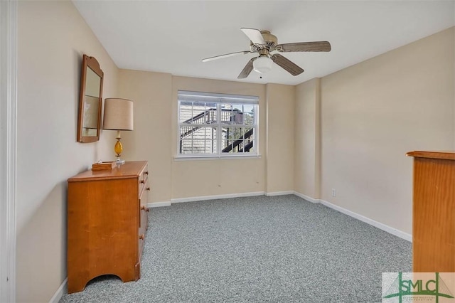 1056 Fiddler Trce, Townsend, GA 31331 - carpeted spare room featuring a ceiling fan and baseboards