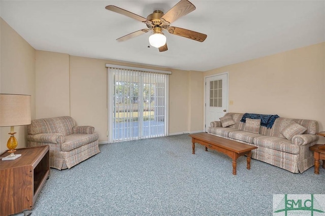 1056 Fiddler Trce, Townsend, GA 31331 - living room with carpet floors, ceiling fan, and baseboards