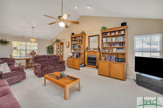 1056 Fiddler Trce, Townsend, GA 31331 - living area with light colored carpet, ceiling fan, and high vaulted ceiling
