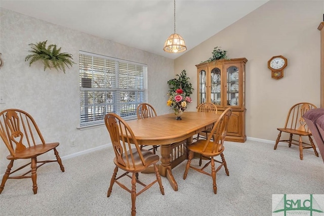 1056 Fiddler Trce, Townsend, GA 31331 - dining space with light colored carpet, lofted ceiling, and baseboards