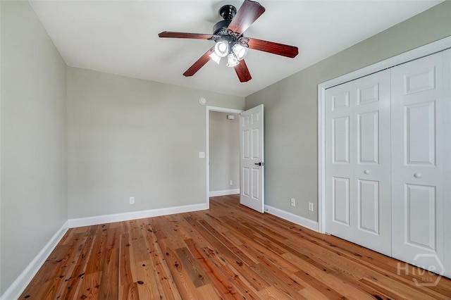 428 Roberts Way, Rincon, GA 31326 - unfurnished bedroom featuring baseboards, a closet, light wood-style flooring, and ceiling fan