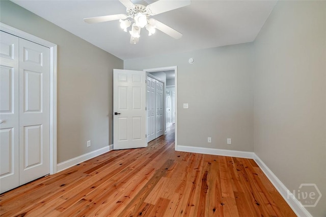 428 Roberts Way, Rincon, GA 31326 - unfurnished bedroom featuring baseboards, light wood-style flooring, and ceiling fan