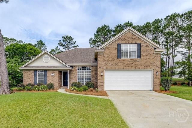 428 Roberts Way, Rincon, GA 31326 - traditional-style home with brick siding, concrete driveway, a front yard, a garage, and roof with shingles
