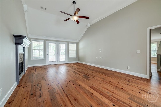 428 Roberts Way, Rincon, GA 31326 - unfurnished living room with lofted ceiling, ceiling fan, a fireplace, crown molding, and hardwood / wood-style flooring