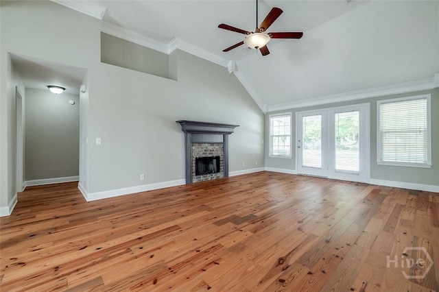 428 Roberts Way, Rincon, GA 31326 - unfurnished living room with light wood-type flooring, a ceiling fan, baseboards, a fireplace, and ornamental molding