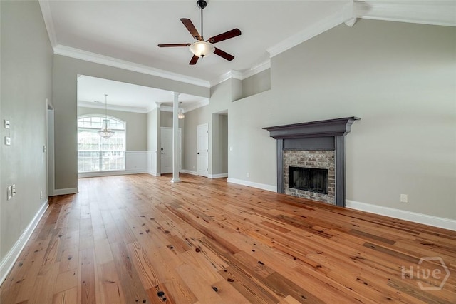 428 Roberts Way, Rincon, GA 31326 - unfurnished living room with ceiling fan, a fireplace, light wood-type flooring, crown molding, and baseboards