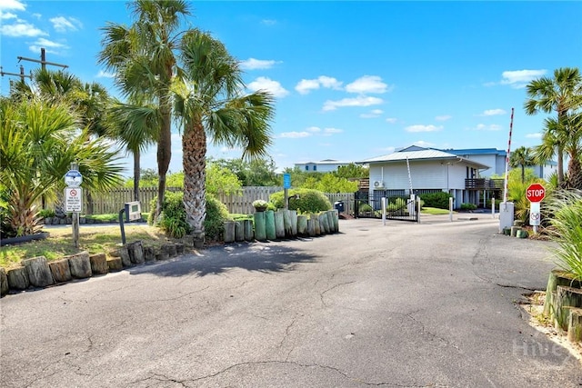 1217 Bay St Unit 105B, Tybee Island, GA 31328 - view of road featuring traffic signs and a gate