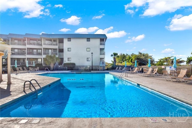 1217 Bay St Unit 105B, Tybee Island, GA 31328 - community pool with a patio