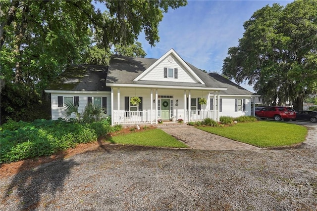 8813 Whitefield Ave, Savannah, GA 31406 - view of front of property with a porch and a front yard